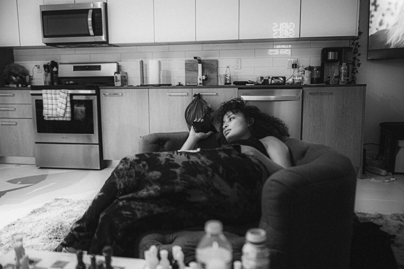 Couple relaxing at home in warm light