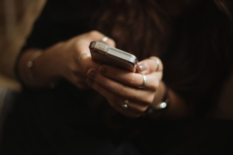 Person using a smartphone in a calm setting
