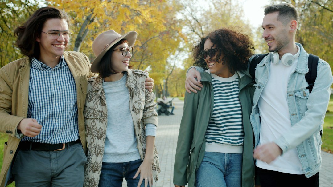 Friends walking outdoors and enjoying time together away from their phones